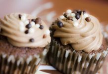 Brownie Cupcakes With Peanut Butter Frosting Brownie Cupcakes with Peanut Butter Frosting and Chocolate Sprinkles.