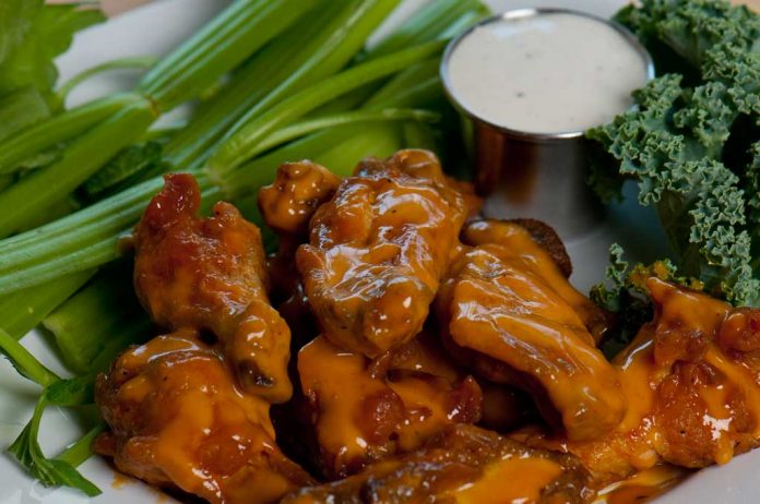 Key Lime Barbecue Wings Key Lime Barbecue Wings on a plate with celery and blue cheese sauce.