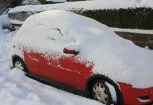 If you’re going to use de-icers this winter, use them responsibly car in snow