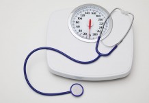Eating fewer, larger meals may be healthier for obese women photo of a scale