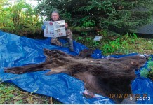 Vaction With Us… Bergmeyer Bob Bergmeyer, of Canton, Ohio, takes a break to read Farm and Dairy while bear hunting in Cordova, Alaska. Bergmeyer spent his birthday in Alaska, hunting brown bear and moose. He got a bear his second day out, but while he was out hunting moose later, the bears ransacked his campsite. He still had a good time visiting with friends -- and he came home with a bear and about 50 pounds of halibut!