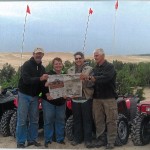 Vacation With Us… Miller Chuck and Tina Dazey, of Louisville, Ohio, and Gary and Linda Miller, of Hartville, Ohio, brought Farm and Dairy four-wheeling on the sand dunes of Lake Michigan for a week. After all the fun on the hills in the sand and mud, we had to empty our shoes!
