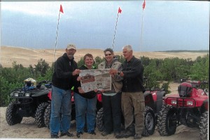 Chuck and Tina Dazey, of Louisville, Ohio, and Gary and Linda Miller, of Hartville, Ohio, brought Farm and Dairy four-wheeling on the sand dunes of Lake Michigan for a week. After all the fun on the hills in the sand and mud, we had to empty our shoes!