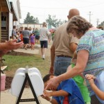 ppl at handwashing station.JPG