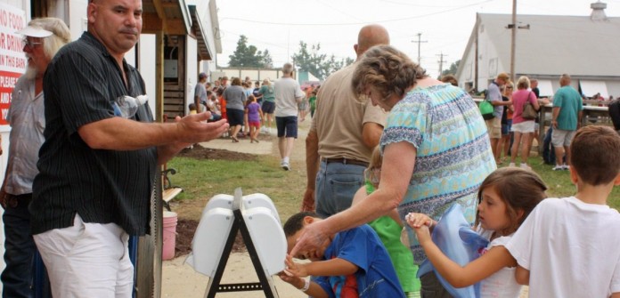 ppl at handwashing station.JPG