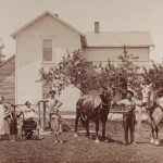 A family photo, horses included