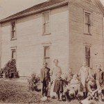 A farm family and their home