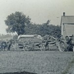 Posing with farm equipment