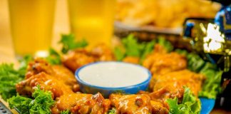 Super-safe food for Super Bowl Sunday Sweet Gingered wings on a plate.