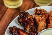 Teriyaki Chicken Wings Teriyaki Chicken Wings on a plate with Ranch Dressing in a bowl in the middle of the wings.