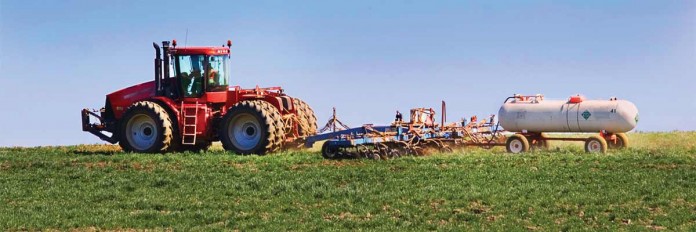 Tractor working in field
