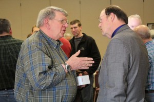 ODA Director Dave Daniels (right) speaks with Fred Finney, produce grower.