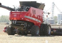 USDA report: Farm profitability weakens in 2015 Massey Ferguson combine.Farm Science Review