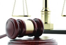 Landowners in CAUV lawsuit want to keep case in Ashtabula gavel and scales of justice