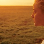 Building character starts in childhood girl and sunset over farmland