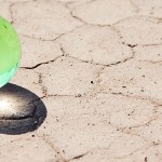 Crop insurance goes global marble globe on parched ground
