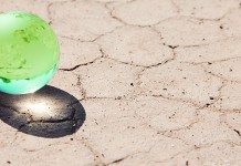 Crop insurance goes global marble globe on parched ground