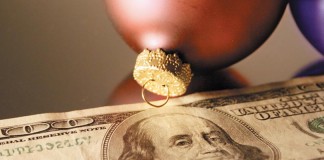 Christmas bulbs and $100 bill