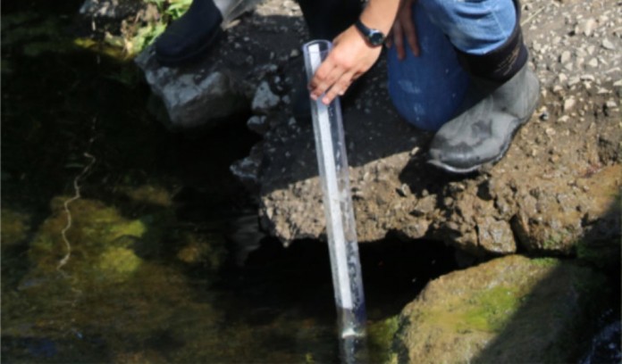 Envirothon students testing water Envirothon students testing water
