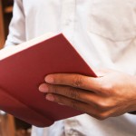 Holiday book gift ideas for the nature lover reading book in library