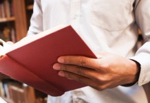 Holiday book gift ideas for the nature lover reading book in library