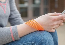 During adolescence, parents and teens change in opposite ways Teen with phone