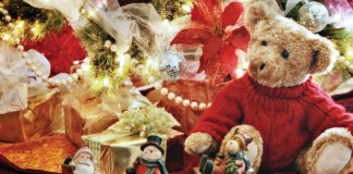 Times have changed: Christmas then, now toys by Christmas tree