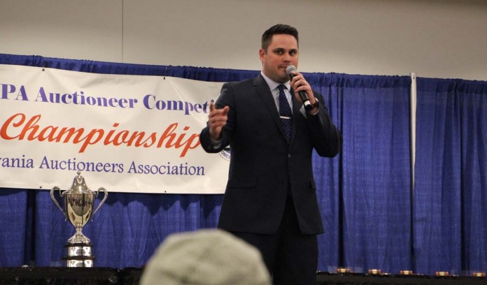 Daniel Reeder competes in bid calling contest