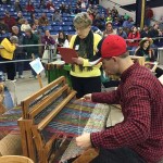Josh Stoner works on the loom