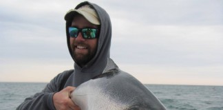 2016 will be a great year for trophy fishing fisherman holding salmon