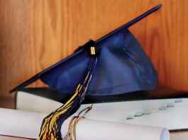 graduation mortarboard and diploma