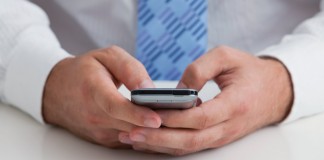 man holding cell phone