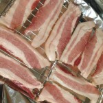 raw bacon on wire racks