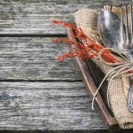 Wants vs. needs and contentment silverware on table