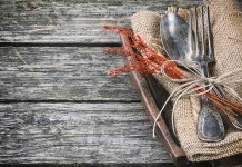 Wants vs. needs and contentment silverware on table