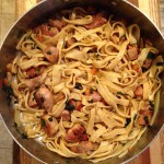 noodles and chicken in pan