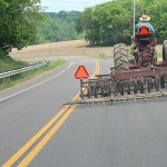 Slow Moving Vehicle sign saving lives for 50 years SMV signs in use