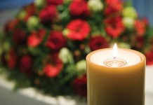 Memories of Gram funeral flowers and candle