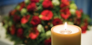 Memories of Gram funeral flowers and candle