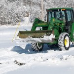 Eastern US: Get ready for harsher winters tractor plowing snow