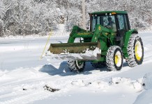 Eastern US: Get ready for harsher winters tractor plowing snow