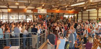 Butler Farm Show market livestock sale results Butler Farm Show crowd before sale