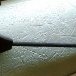 Can you tell us how this antique tool was used? Item 1088 has a pyramid shaped head that is about 4 inches at its base with ridges and teeth on the bottom. The head tapers back into a long cylindrical pole.