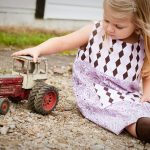 The curiosity of a child on the farm Little girl