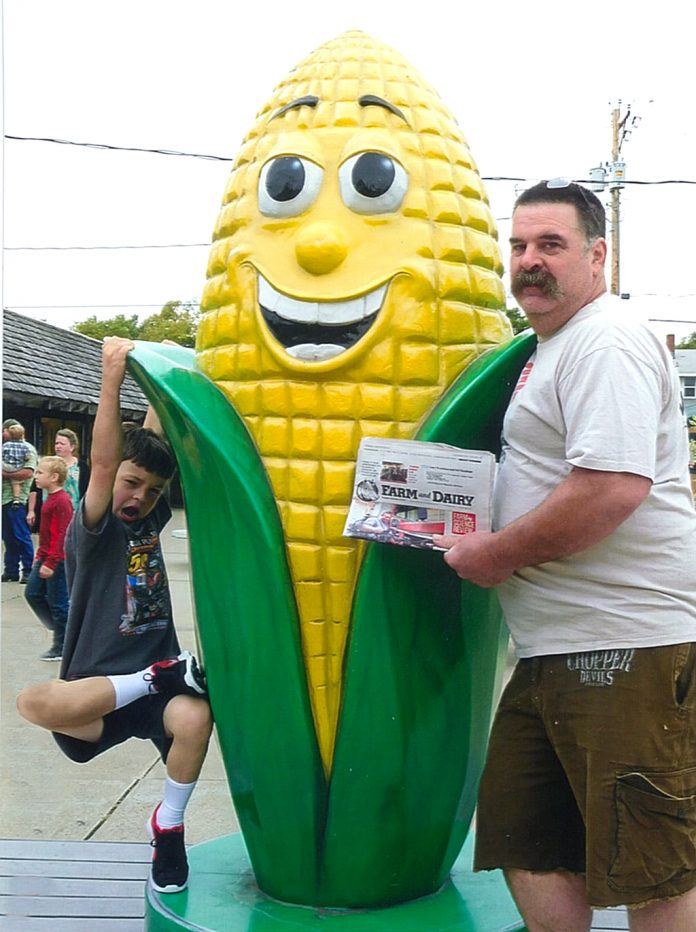 Tom and TJ Logan visiting the Corn Palace in South Dakota with the Farm and Dairy