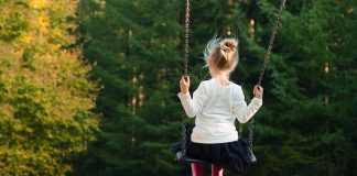 girl on swingset