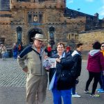 Visiting the Castle’s of Scotland with the Larricks The Larricks standing in front of Edinbugh Castle in Scotland with their Farm and Dairy