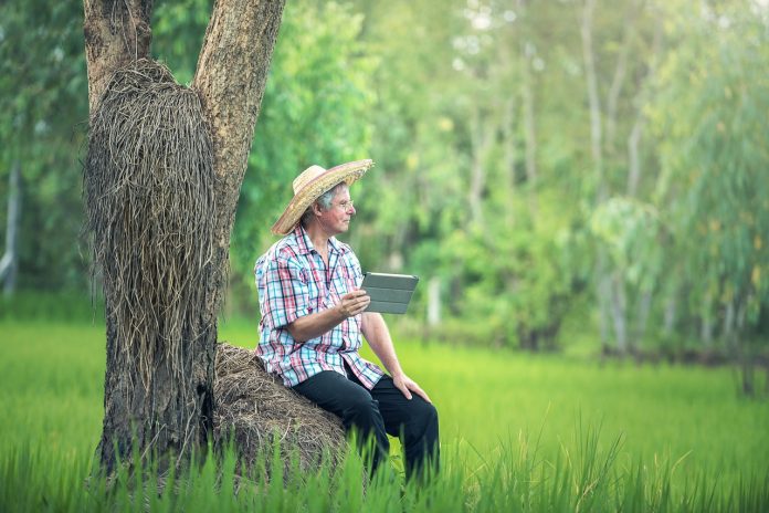 farmer with tablet