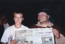 Stephen Kronenberger reads the Farm and Dairy in Rochester