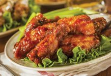 Maple Bourbon Chipotle Chicken Wings A plate of Maple Bourbon Chicken Wings